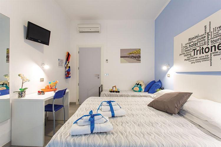 Hotel Tritone Rimini Bagian luar foto